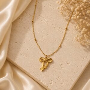 PEARL AND EMERALD CHARM GOLD NECKLACE